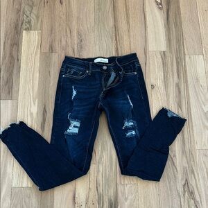 Distressed Dark Blue Jeans